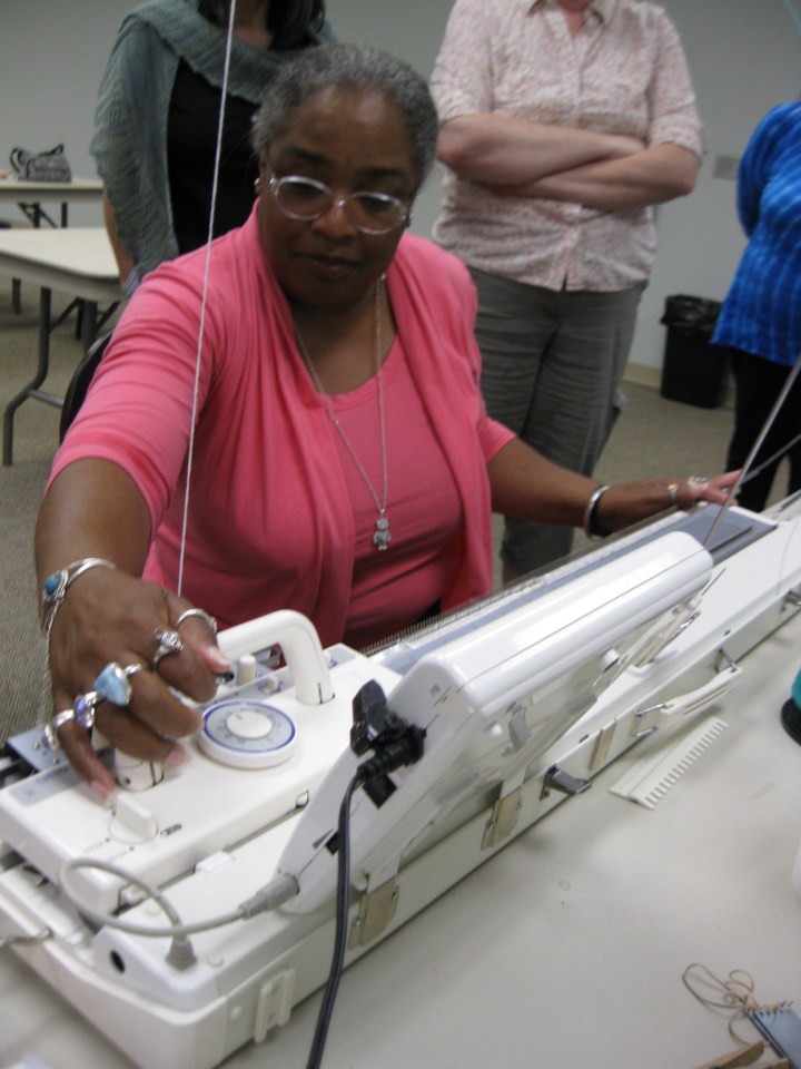 Michelle at knitting machine