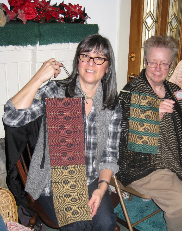 Jackie with wall hangings in Snail's Trail