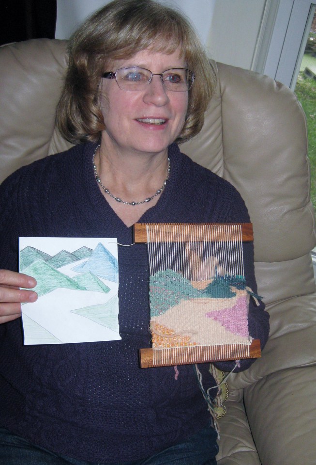Linda with cartoon and tapestry